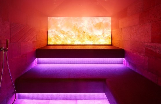 Steam sauna with atmospheric lighting in various colours.
